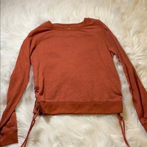 orange lace up crew neck.